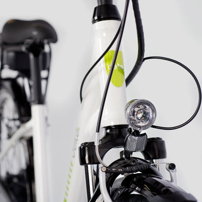 Front lights of rDrive e-bike on gray background