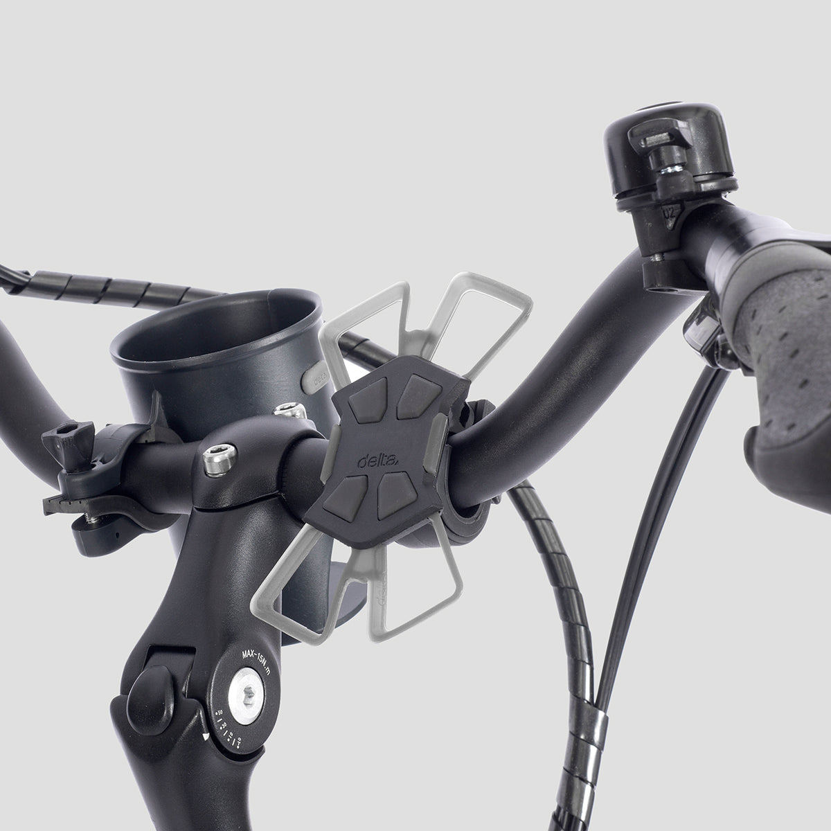 E-bike comes with two bonus accessories, mobile holder and beverage holder on gray background